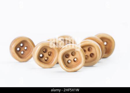 Standing brown buttons isolated on a white background with copy space Stock Photo