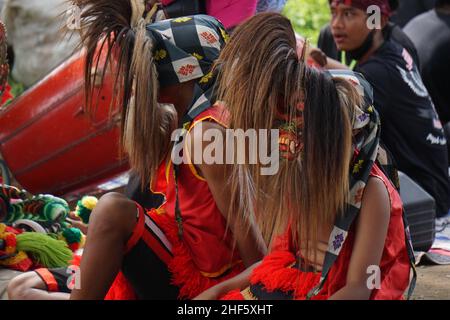 The artist performing Jaranan music dancers and playing a traditional instrument. Jaranan (kuda lumping, kuda kepang) is dance from java Stock Photo