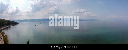 Panorama lake Ohrid surrounded by Albanian mountains in North Macedonia on a clear sunny day in summer. Stock Photo