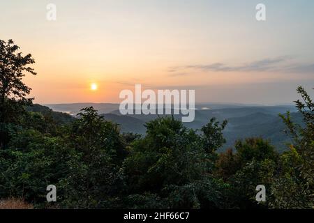 Magnificent view of sunset from Shri Siddhanath Temple in Borim, Ponda, Goa. Zuari river can be seen at a distance. Stock Photo