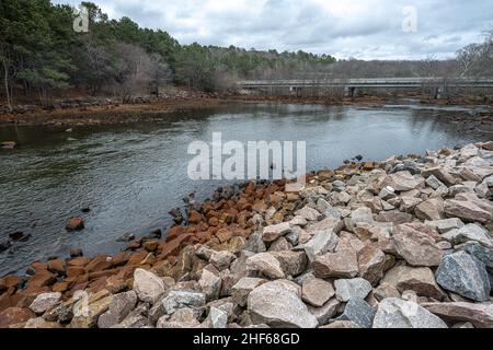 Below the Falls Lake Dam in Raleigh with the Falls of Neuse Road Crossing, NC Stock Photo