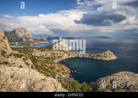 Crimea,  Novyi Svit landscape. Cape Kapchik,  Mount Falcon suring autumn season with beautiful cloudscape. Stock Photo