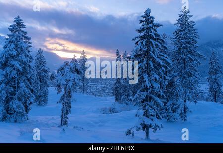 Sunset over Garmisch-Partenkirchen in winter,  Bavaria,  Germany Stock Photo