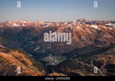Wild mountain landscape with snow-capped mountains after sunset. Warth towered over by the Lechtal Alps. Tyrol,  Vorarlberg,  Austria,  Europe Stock Photo