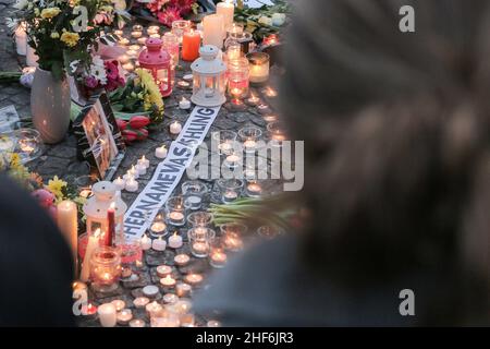 Belfast, UK. 14th Jan, 2022. 14th January, 2022, Belfast City Hall. A candlelit vigil for 23 year old Ashling Murphy. Credit: Pathos Images/Alamy Live News Stock Photo