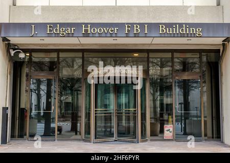 Edgar Hoover FBI Headquarters Building Facade in Washington DC, VA, USA. Entrance with Rotating Circle Door Stock Photo