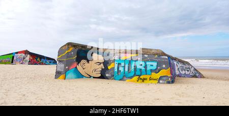 Graffiti on the bunker walls at Plage Le Gurp,  France,  Atlantic coast,  Bordelaise, Stock Photo