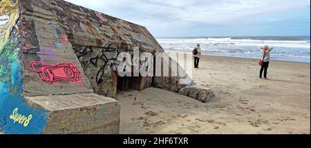 Graffiti on the bunker walls at Plage Le Gurp,  France,  Atlantic coast,  Bordelaise, Stock Photo