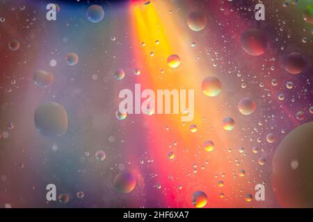 Oil bubbles on water surface,  multicolored background,  abstract image Stock Photo
