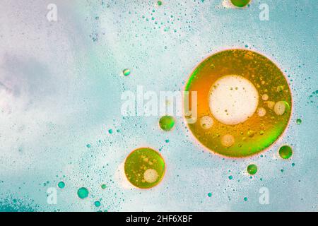 Oil bubbles on water surface,  multicolored background,  abstract image Stock Photo