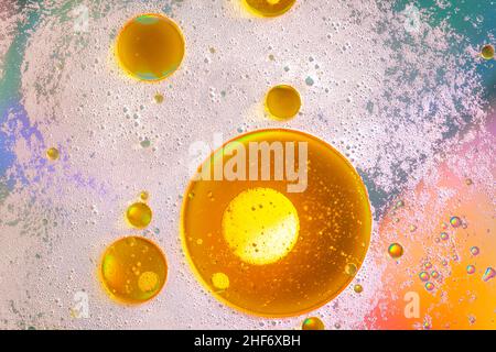 Oil bubbles on water surface,  multicolored background,  abstract image Stock Photo