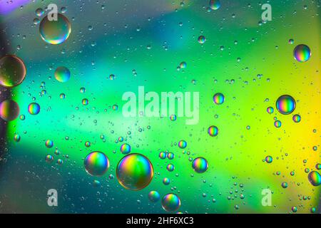 Oil bubbles on water surface,  multicolored background,  abstract image Stock Photo