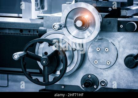 Lathe control knobs close up. Metal machine tools industry. The metalworking process by turning machine. Stock Photo