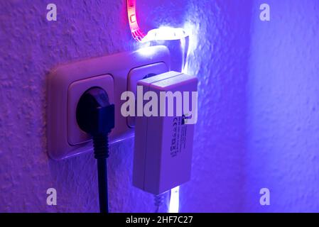 Two occupied sockets in a child's room. Stock Photo