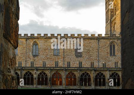 Durham, UK - 29 August 2019: The courtyard inside Durham Cathedral. Glowing, illuminating in the evening, night. Harry potter filmed scenes here. Beau Stock Photo