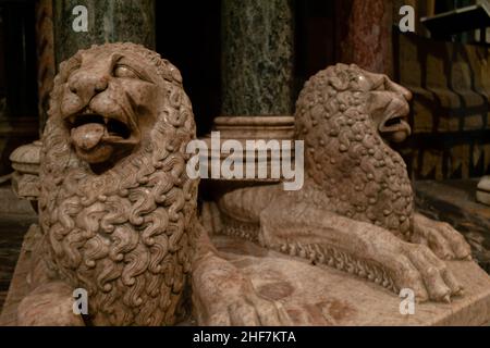 Durham, UK - 29 August 2019: Carved lion cubs underneath the pulpit in The Nave of Durham Cathedral. Interior sculptures inside Durham's historic Cath Stock Photo