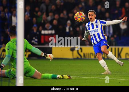 Brighton, UK. 14th Jan, 2022. Leandro Trossard of Brighton and Hove Albion's (R) has a shot at goal saved by Jack Butland, the goalkeeper of Crystal Palace (L). Premier league match, Brighton & Hove Albion v Crystal Palace at the Amex Stadium in Brighton on Friday 14th January 2022. this image may only be used for Editorial purposes. Editorial use only, license required for commercial use. No use in betting, games or a single club/league/player publications. pic by Steffan Bowen/Andrew Orchard sports photography/Alamy Live news Credit: Andrew Orchard sports photography/Alamy Live News Stock Photo