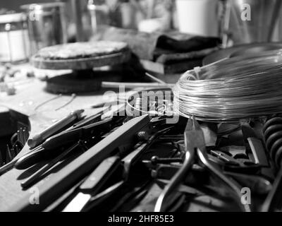 Jewelry workshop,  work table,  tools,  black and white Stock Photo