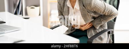 Incontinence, Constipation, Menopause Or PMS Stomach Pain Stock Photo