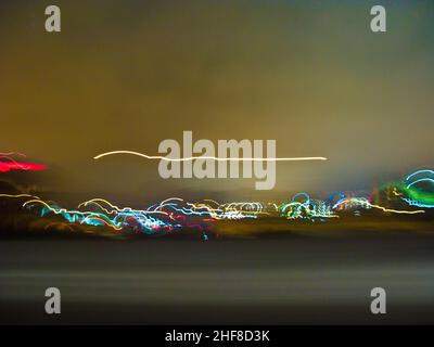 view by night and rain thru the front window of the car Stock Photo - Alamy
