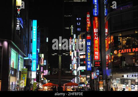 28.04.2013, Seoul, South Korea, Asia - Colourful signs and neon-lit streets of the busy Insadong entertainment district at night that is lined with ba Stock Photo