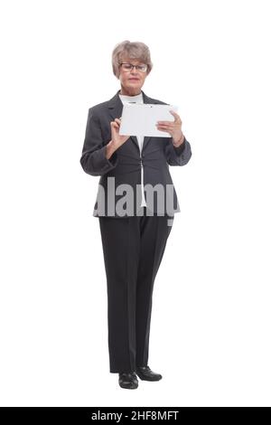 Adult female in black suit holding business papers in her hand Stock Photo