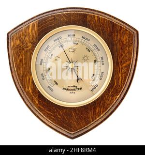 Vintage wooden clock with barometer and Old marine style thermometer on a white background. Wall decor for the interior. Stock Photo