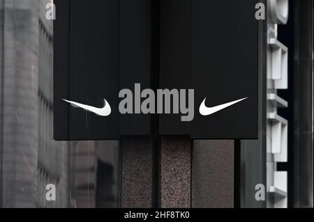 View of the Nike “Swoosh” logo at the footwear's retail on Fifth Avenue in New York, NY, January 14, 2022. According to reports, Nike, an American footwear manufacturing company plans to fire employees who have not received a or religious ...