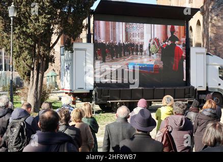 Rome, Italy. 14th Jan, 2022. People attend on a widescreen the funeral Mass of the President of the European Parliament David Sassoli, Rome, Italy, January 14, 2022. Authorities and common people attend the burial service at Santa Maria degli Angeli church.Sassoli, born in Florence, Italy, in 1956, died on January 11 2022 while serving as the President of the European Parliament. He was appointed on July 3 2019. (Photo by Elisa Gestri/Sipa USA) Credit: Sipa USA/Alamy Live News Stock Photo