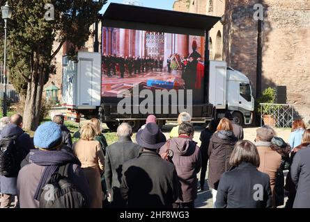 Rome, Italy. 14th Jan, 2022. People attend on a widescreen the funeral Mass of the President of the European Parliament David Sassoli, Rome, Italy, January 14, 2022. Authorities and common people attend the burial service at Santa Maria degli Angeli church.Sassoli, born in Florence, Italy, in 1956, died on January 11 2022 while serving as the President of the European Parliament. He was appointed on July 3 2019. (Photo by Elisa Gestri/Sipa USA) Credit: Sipa USA/Alamy Live News Stock Photo