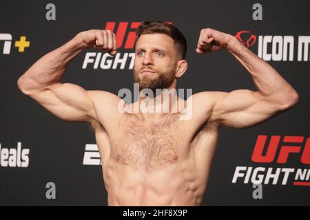 Las Vegas, USA. 14th Jan, 2022. LAS VEGAS, NV - JANUARY 14: Calvin Kattar poses on the scale during the UFC Vegas 46: Kattar v Chikadze Weigh in at UFC Apex on January 14, 2022 in Las Vegas, Nevada, United States. (Photo by Diego Ribas/PxImages) Credit: Px Images/Alamy Live News Stock Photo