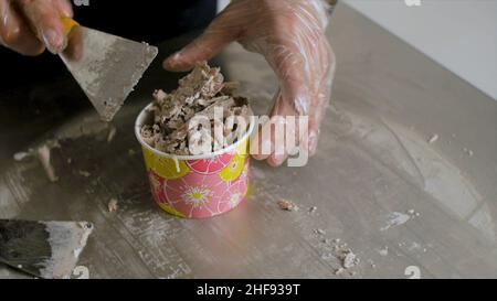 Process of making fried ice-cream. Clip. Thailand stir-fried ice cream rolls at freeze pan. Organic, natural rolled ice cream, hand made dessert. Frie Stock Photo