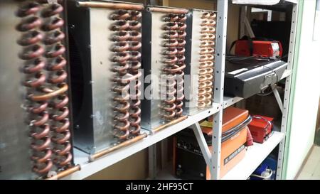 Full store room at the repair garage. Workshop tool board with various hand tools for repairing and woodworking Stock Photo