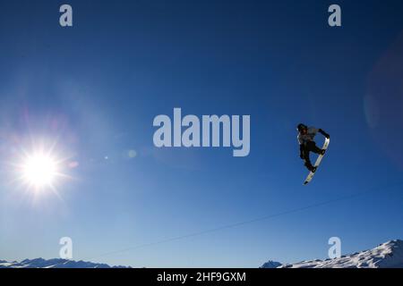 Laax, Switzerland. 14th Jan, 2022. Su Yiming of China competes during the men's snowboard slopestyle semifinal at FIS Snowboard World Cup 2022 in Laax, Switzerland, Jan. 14, 2022. Credit: Zhang Cheng/Xinhua/Alamy Live News Stock Photo