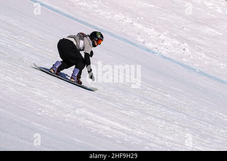 Laax, Switzerland. 14th Jan, 2022. Su Yiming of China competes during the men's snowboard slopestyle semifinal at FIS Snowboard World Cup 2022 in Laax, Switzerland, Jan. 14, 2022. Credit: Zhang Cheng/Xinhua/Alamy Live News Stock Photo