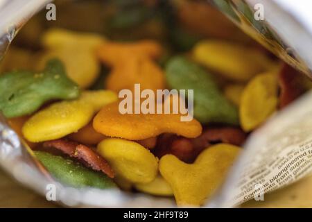 Close up of Gold Fish Crackers multi colored in the bag . High quality photo Stock Photo