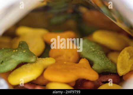 Close up of Gold Fish Crackers multi colored in the bag . High quality photo Stock Photo