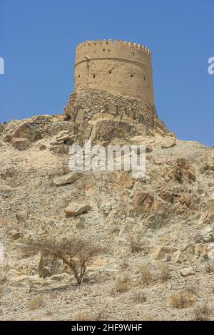 An old watchtower at Hatta in the Emirate of Dubai in the United Arab Emirates. Stock Photo