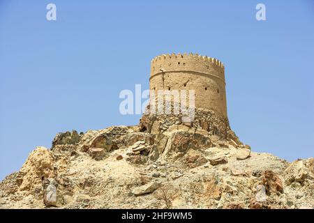 An old watchtower at Hatta in the Emirate of Dubai in the United Arab Emirates. Stock Photo