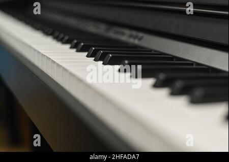 piano keys with light flare in perspective view. Stock Photo
