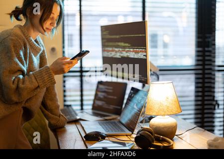 Woman works from cozy home office Stock Photo