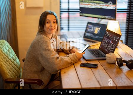 Woman works from cozy home office Stock Photo