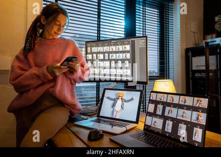 Photographer editing photos at home office Stock Photo