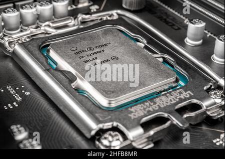 Moscow, Russia - January 12, 2022: Latest Intel i7 12700kf processor chip in socket on MSI z690 motherboard. Intel is one of the worlds largest semico Stock Photo