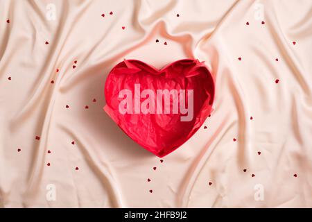 Red opened empty heart-shaped box. Happy Valentines day, Mothers day, birthday concept Stock Photo