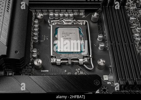 Moscow, Russia - January 12, 2022: Latest Intel i7 12700kf processor chip in socket on MSI z690 motherboard. Intel is one of worlds largest semiconduc Stock Photo