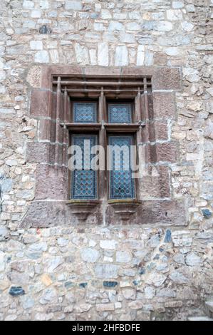 Beautiful design of a small window of a castle Stock Photo