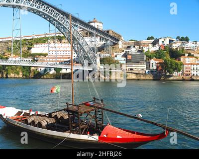 port wine barrels on a boat in Porto in Portugal Stock Photo