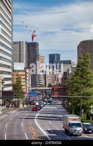 Tokyo, Japan - October 26, 2019:  The view of Yasukuni dori near Yasukuni shrine in the sunny day. Chiyoda. Tokyo. Japan Stock Photo