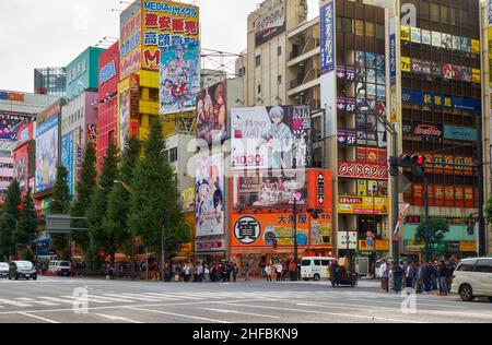 Tokyo, Japan - October 26, 2019:  The view of Akihabara crossroads surrounded by the many manga, anime and electronic shops icons. Chiyoda ward. Tokyo Stock Photo